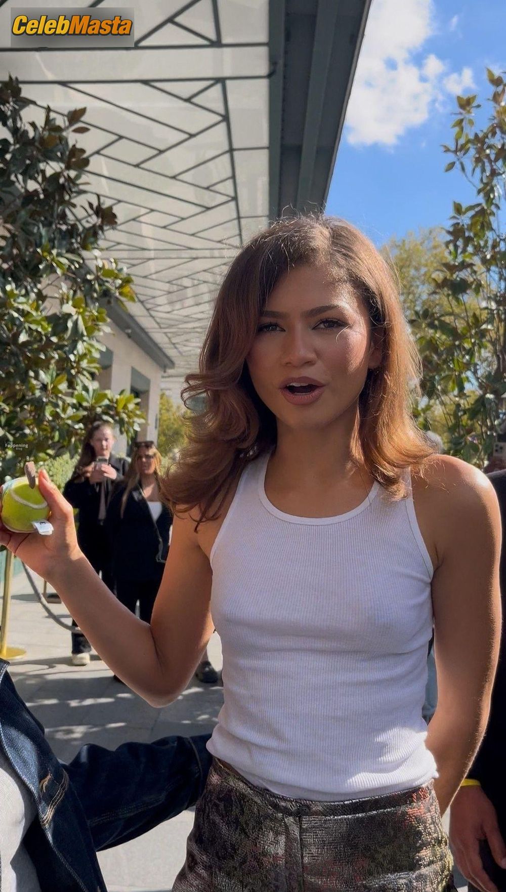 Zendaya Sexy Flashes Her Hot Pokies In A Tight White Tank During Paris Fashion Week In Paris Photo Gallery photo 1