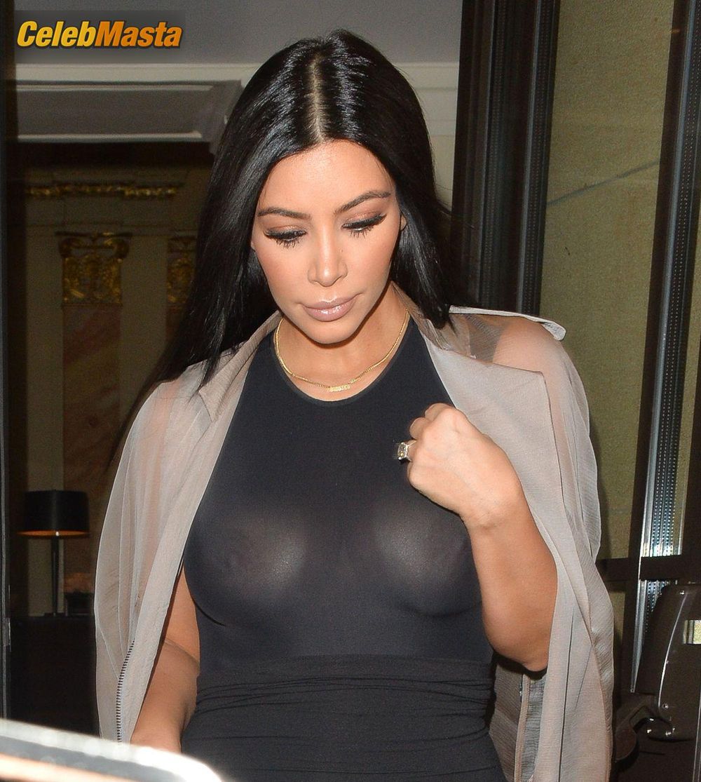 Kim Kardashian Braless in A See-thru Dress Leaving Her Hotel London Photo Gallery photo 1