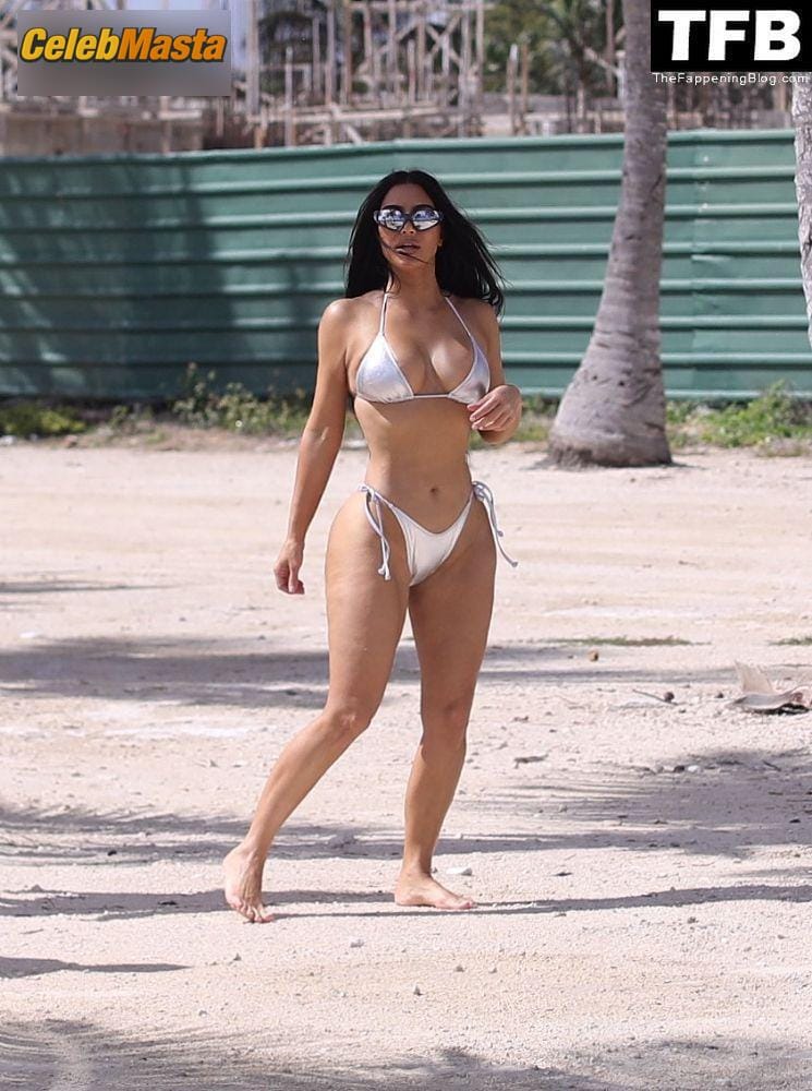 Kim Kardashian Sexy Seen Flaunting Her Hot Curves In A Silver Bikini On The Beach Photo Gallery photo 1