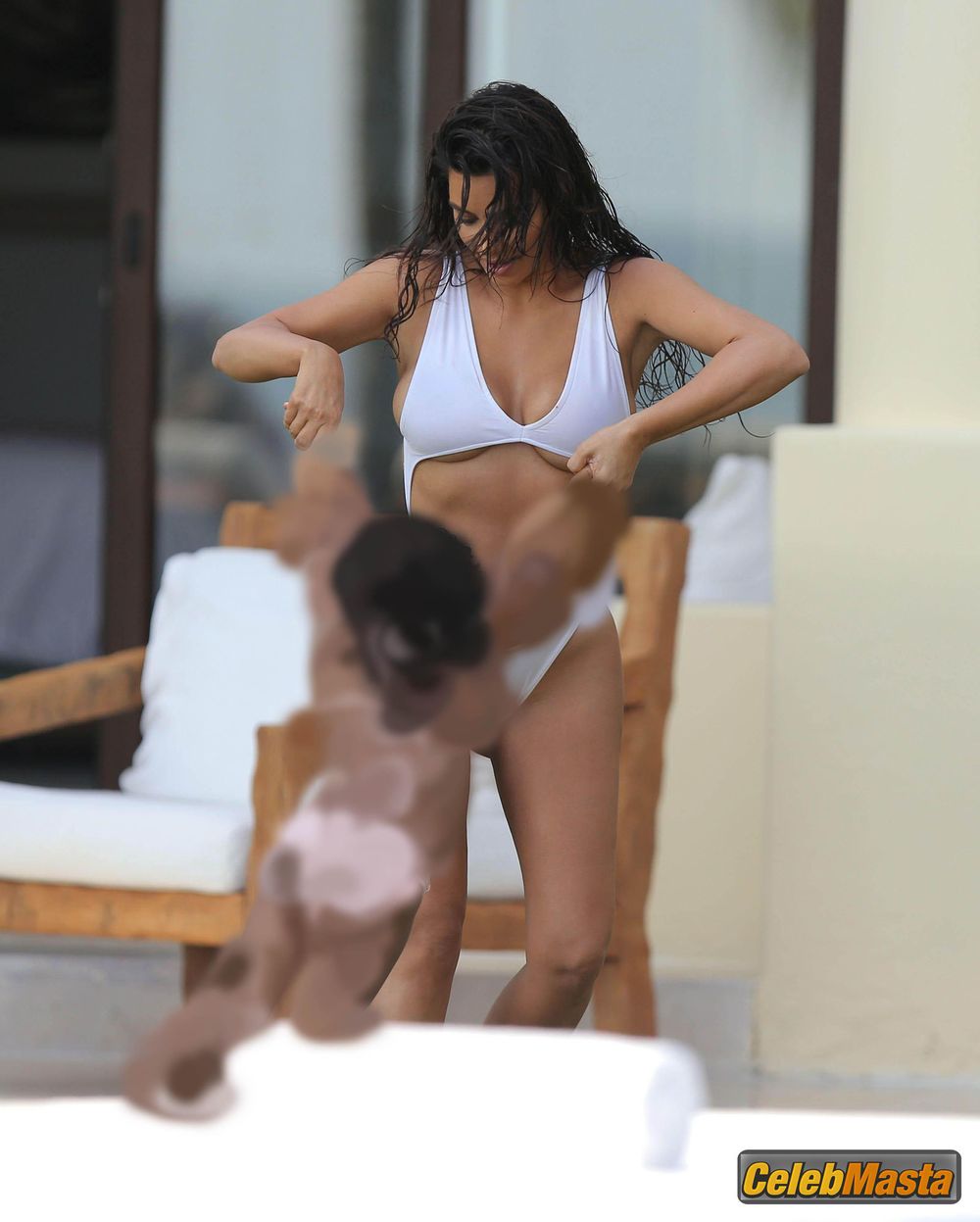 Kim Kardashian Sexy in A White Monokini On Vacation at Casa Aramara Photo Gallery photo 1