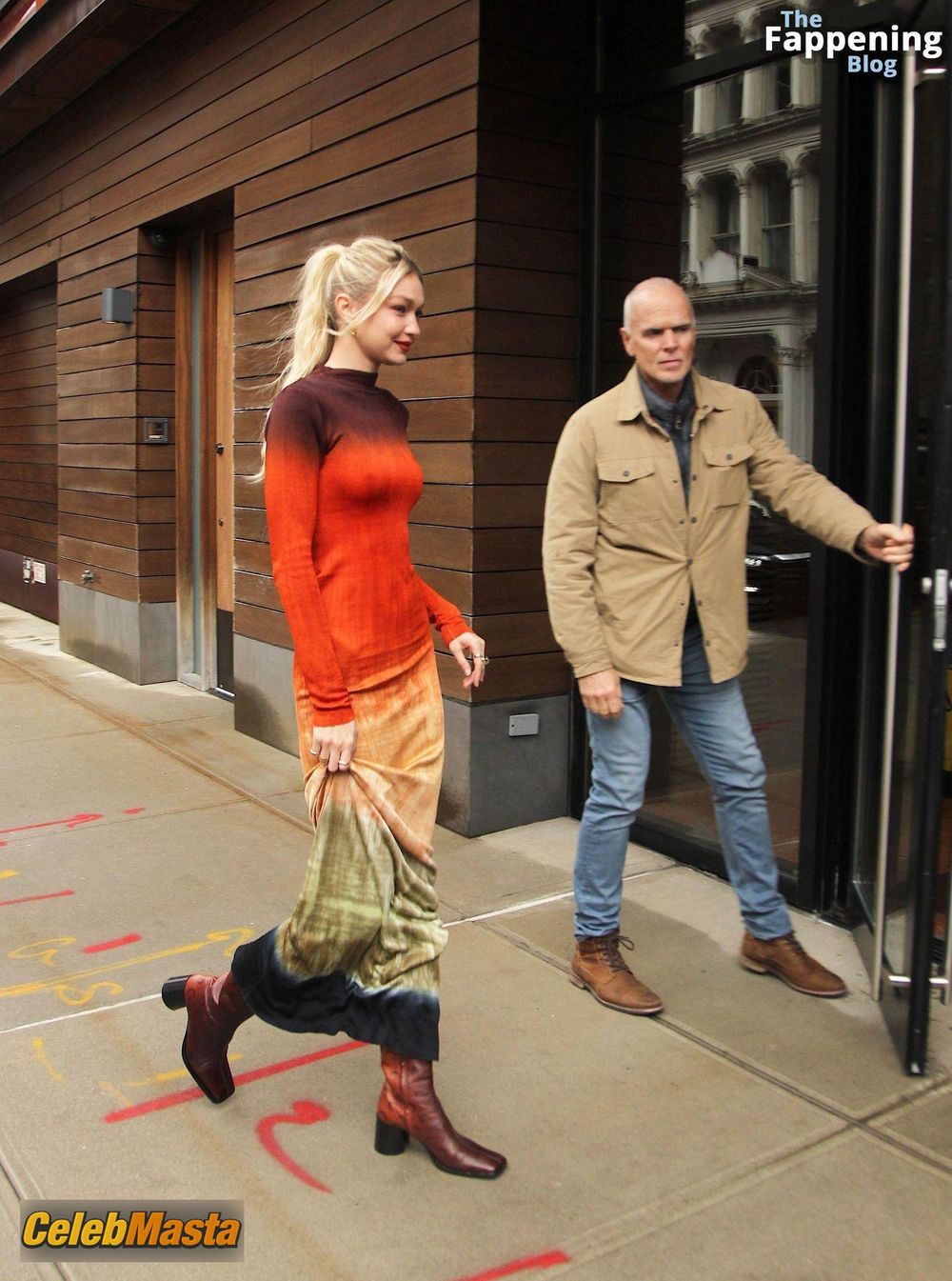Gigi Hadid Returning to Her NoHo Home Wearing a Colorful Dress Photo Gallery photo 1