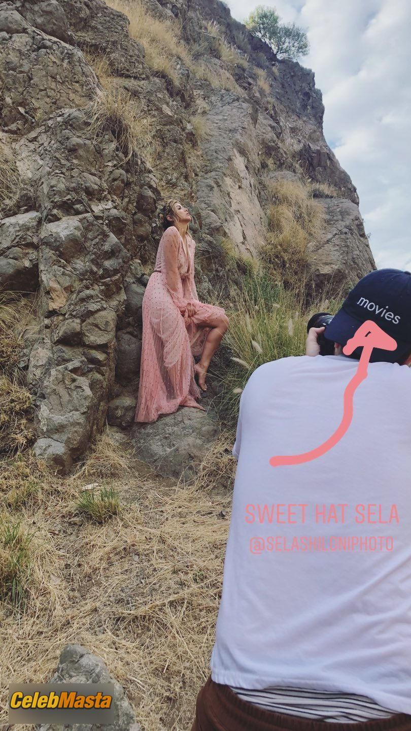 Chloe Bennet Gallery: Braless In A Pink Dress On The Trampoline photo 1