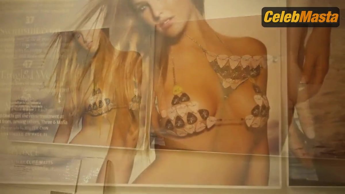 Emily Ratajkowski Flaunts Curves in a Scene from Sports Illustrated Swimsuit 2014 Photo Shoot