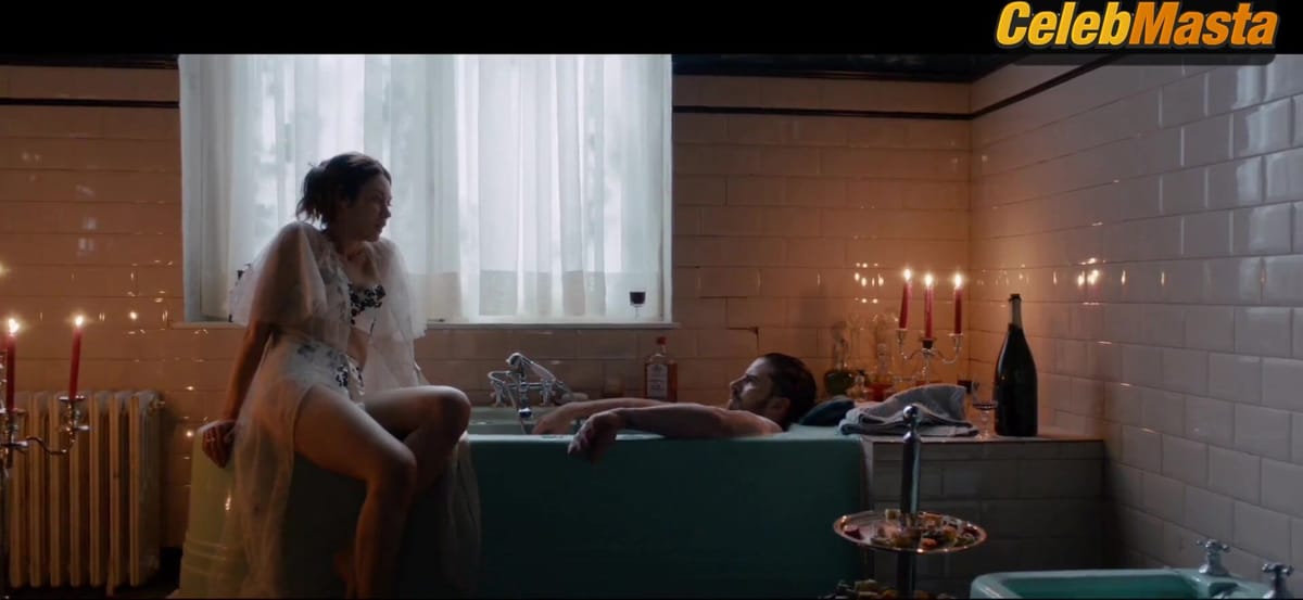Olga Kurylenko's Swimsuit and Underwear Scene in The Room