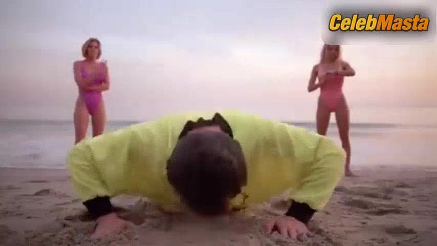 Nicole Eggert and Pamela Anderson's Swimsuit Scene in Baywatch