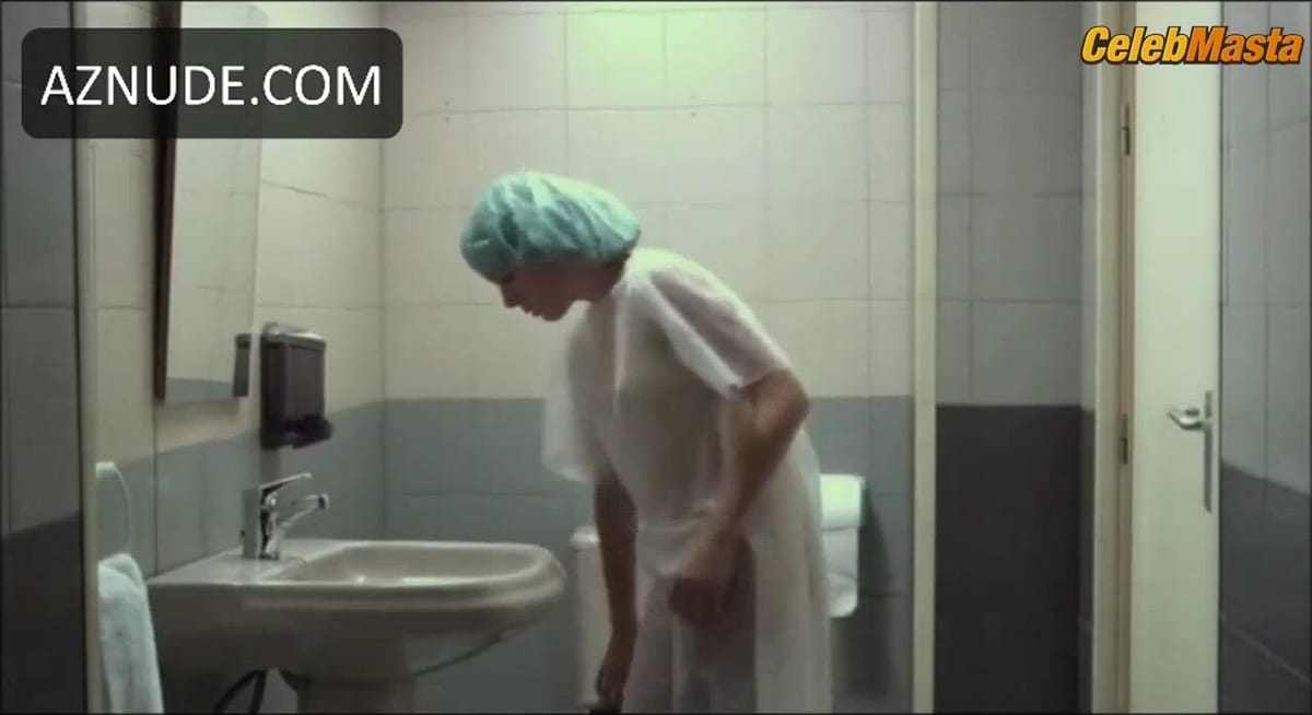 Diana Gomez Bares Boobs in Con Lengua Scene