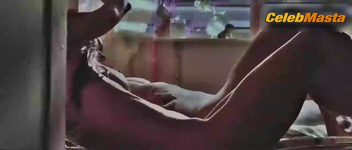 Roselyn Sanchez Bares Breasts in Yellow Scene