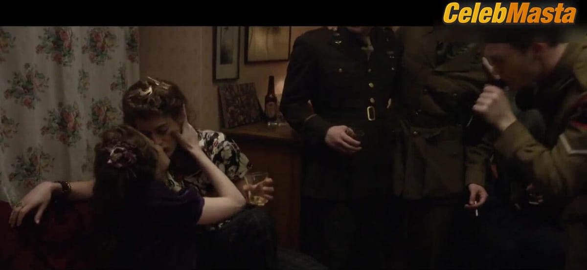 Lizzy Caplan and Charlotte Hope Lesbian Scene from Allied