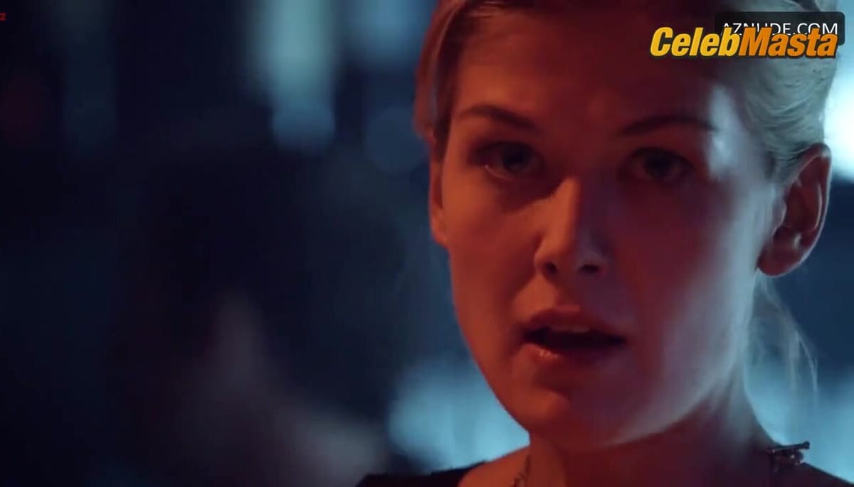Rosamund Pike Shows Her Boobs in an Underwear Scene in Burning Palms