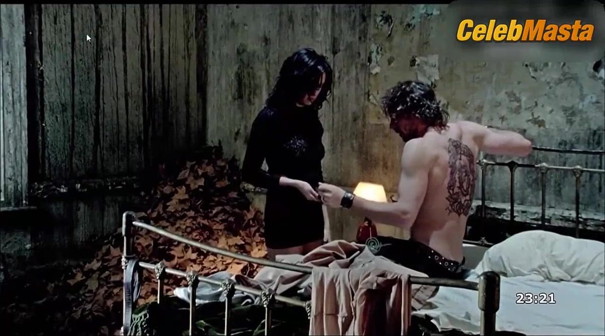 Antonella Costa Bares Breasts in Scene from Olvidame