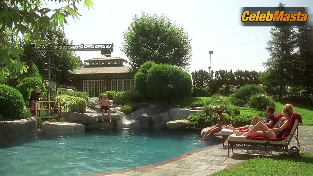Olivia d'Abo Tits, Swimsuit Scene from Greedy