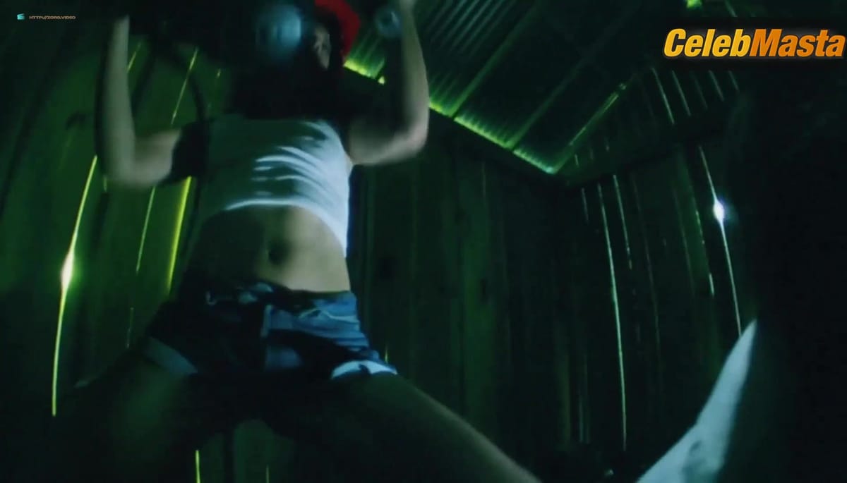 Kari Wuhrer Bares Boobs Scene in King Of The Ants