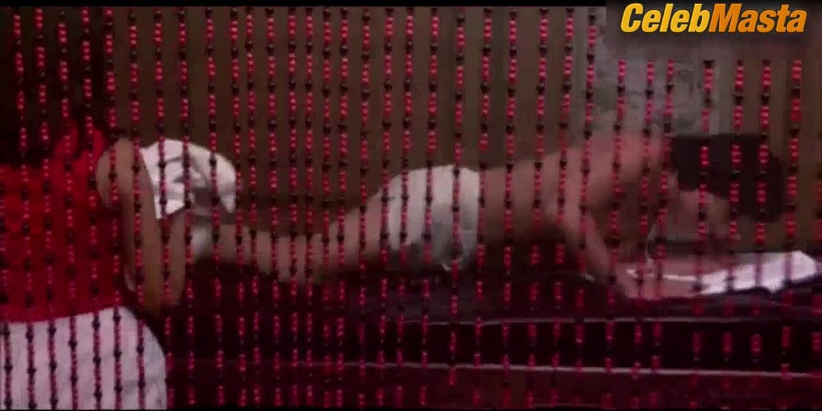 Peggy Tam Shows Butt and Boobs Scene in The Protector