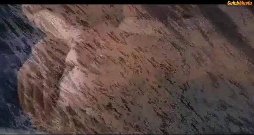 Rosanne Mulholland's Ass and Tits Scene in Falsa Loura