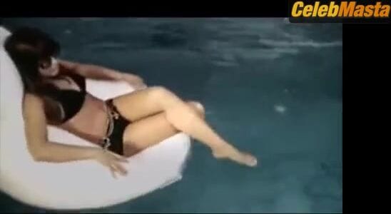 Barbi Benton Flaunts Bikini in a Naughty Cheerleader Scene