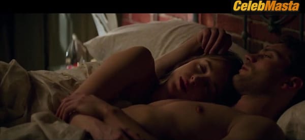 Dakota Johnson Shows Breasts in Scene from Fifty Shades Darker