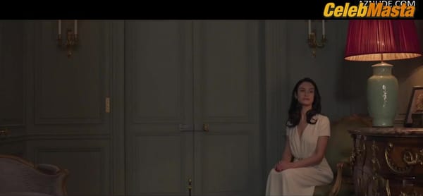 Olga Kurylenko Bares Boobs in a Scene from Les Traducteurs