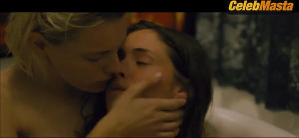 Natalie Krill and Erika Linder Expose Bush and Boobs in Topless Scene in Below Her Mouth