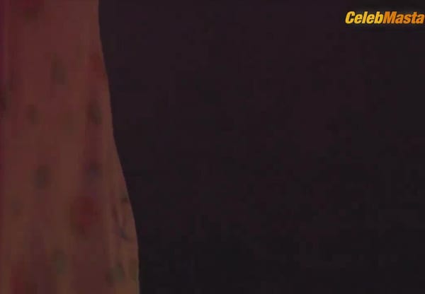 Stacy Martin Bares Breasts in Rosy Scene