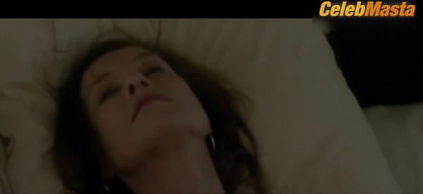 Isabelle Huppert Bares Boobs in Elle Scene