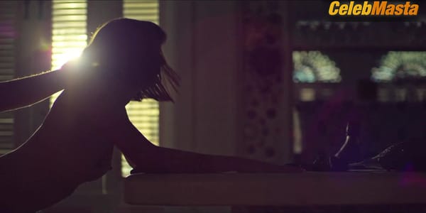 Gaite Jansen Bares Boobs in Scene in Leopard Skin