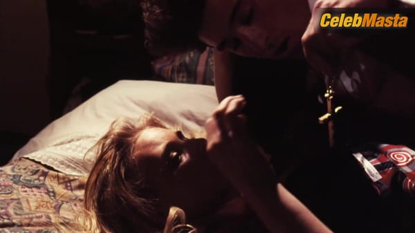 Olivia d'Abo Flaunts Tits Scene in Bank Robber