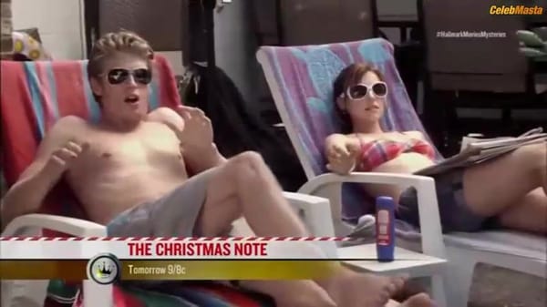 Emma Lahana's Tits, Bikini Scene in Trading Christmas