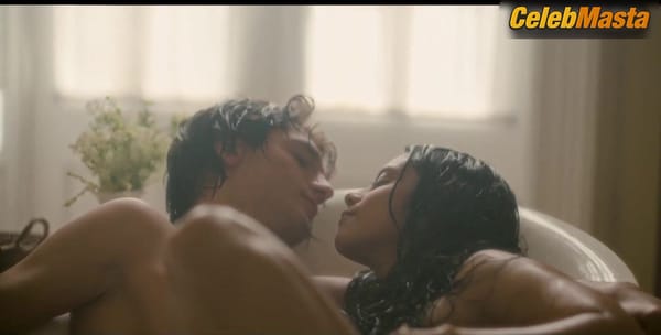 Renata Vaca Bares Breasts in Lovesick Scene