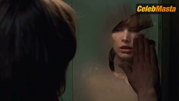 Milla Jovovich Bares Boobs in Lesbian Scene, .45