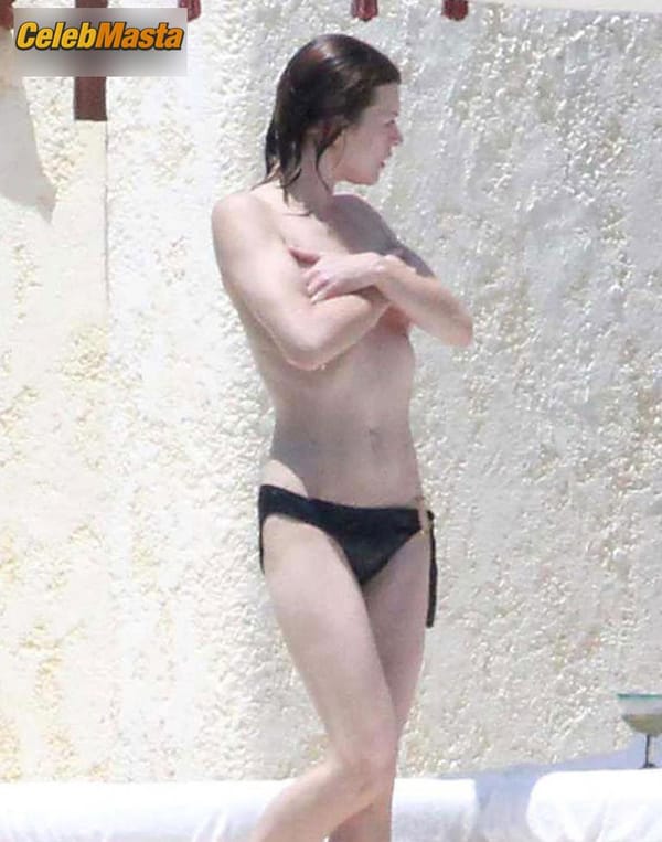 Milla Jovovich Photos from Beach Babes photo 6