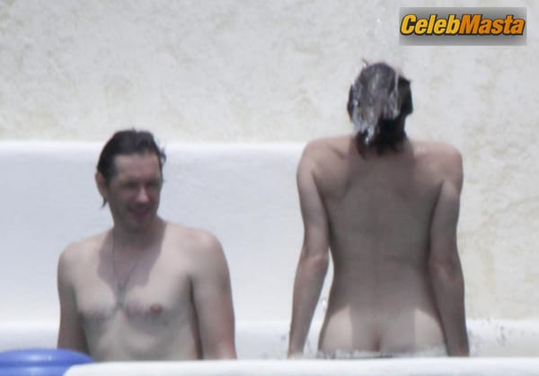 Milla Jovovich Photos from Beach Babes photo 7