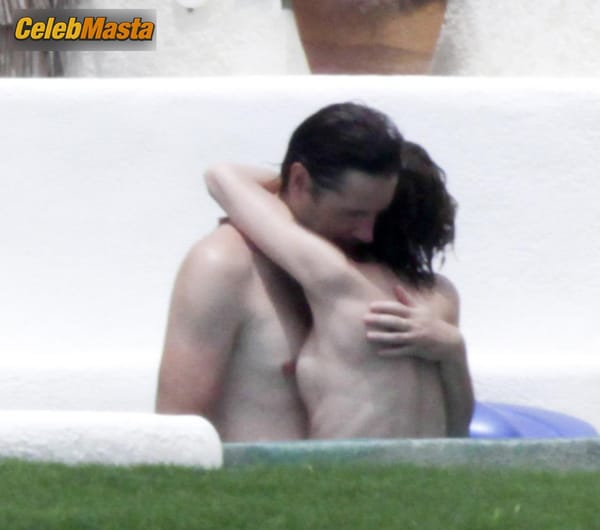 Milla Jovovich Photos from Beach Babes photo 9