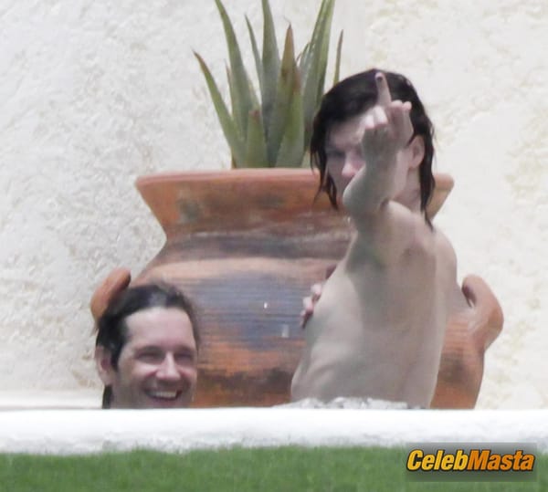 Milla Jovovich Photos from Beach Babes photo 10