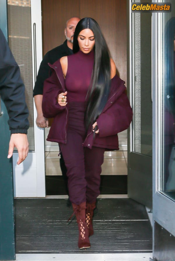 Kim Kardashian flashes Big Boobs in Sheer Purple Top in New York City photo 14