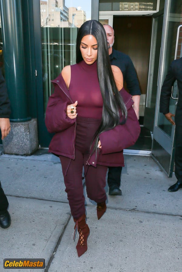 Kim Kardashian flashes Big Boobs in Sheer Purple Top in New York City photo 15
