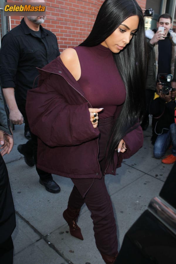 Kim Kardashian flashes Big Boobs in Sheer Purple Top in New York City photo 18