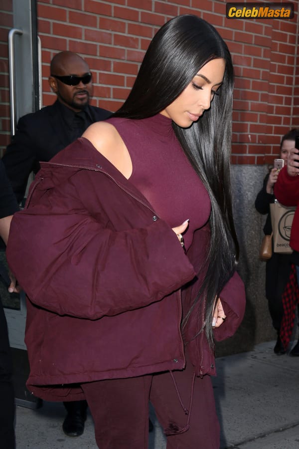 Kim Kardashian flashes Big Boobs in Sheer Purple Top in New York City photo 19