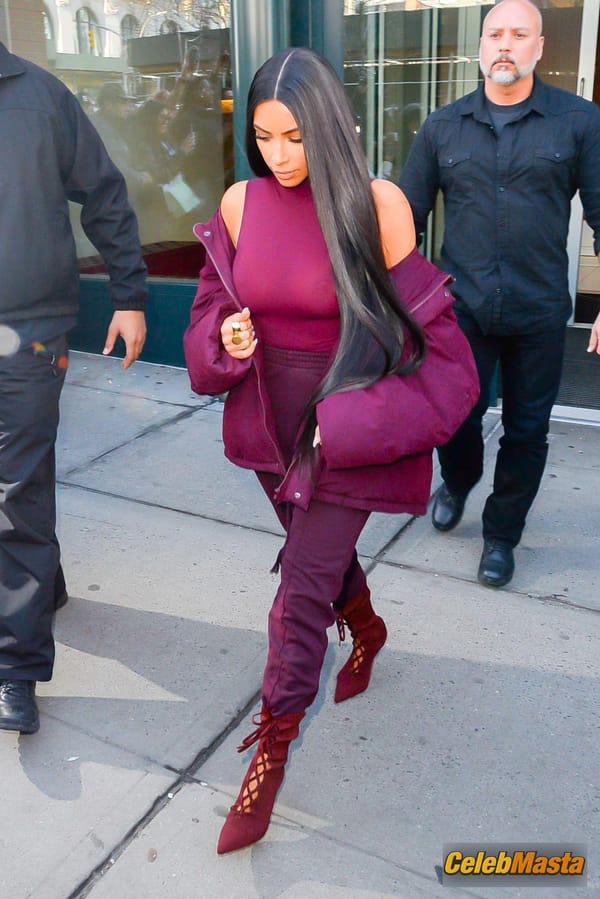 Kim Kardashian flashes Big Boobs in Sheer Purple Top in New York City photo 23