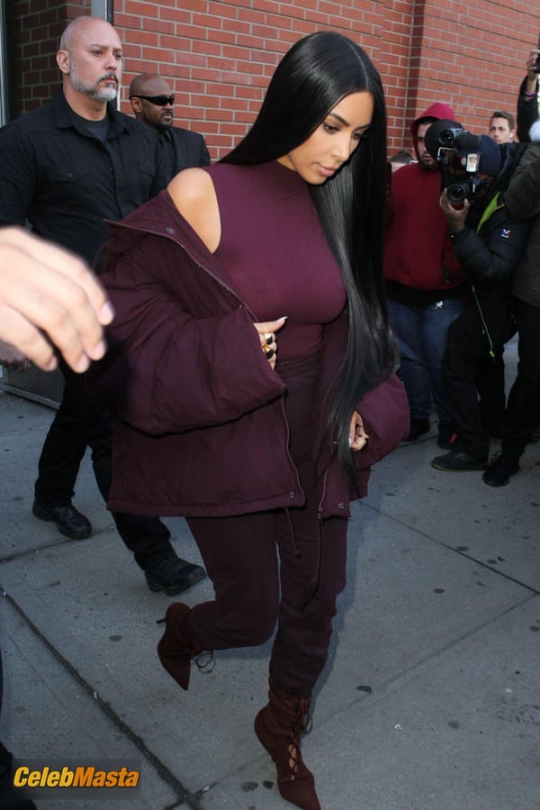Kim Kardashian flashes Big Boobs in Sheer Purple Top in New York City photo 27