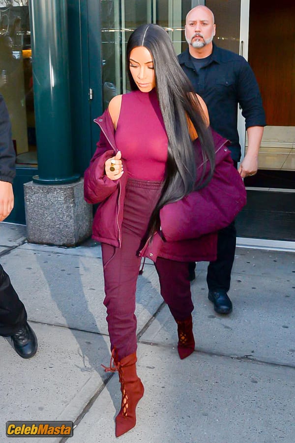 Kim Kardashian flashes Big Boobs in Sheer Purple Top in New York City photo 30