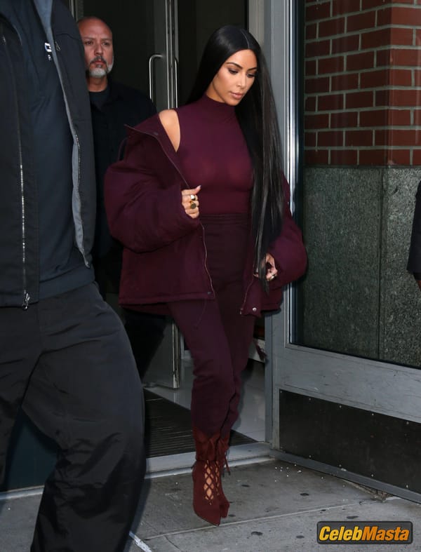 Kim Kardashian flashes Big Boobs in Sheer Purple Top in New York City photo 54