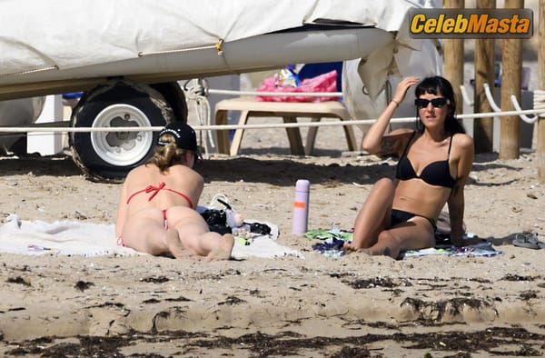 Madelyn Cline in a Red Bikini at Sitges Beach, Barcelona photo 6
