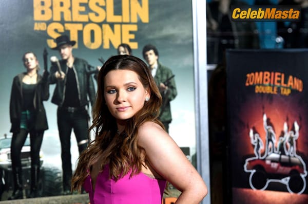Abigail Breslin posing in a pink dress at the ‘Zombieland Double Tap’ Premiere at Regency Village Theatre in Westwood photo 42