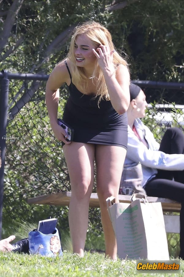 Addison Rae Legs in a Sheer Mini Dress at a Park, Los Angeles photo 53
