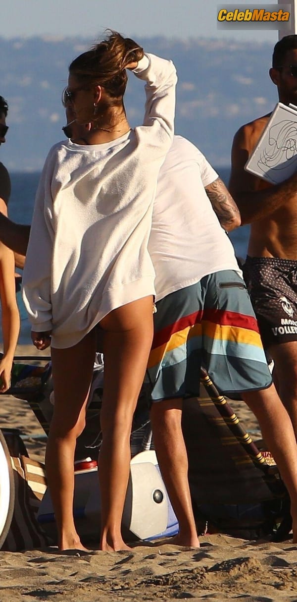 Alessandra Ambrosio putting her amazing curves on display in a cheeky black bikini during an afternoon spent on the beach playing volleyball in Los Angeles photo 11