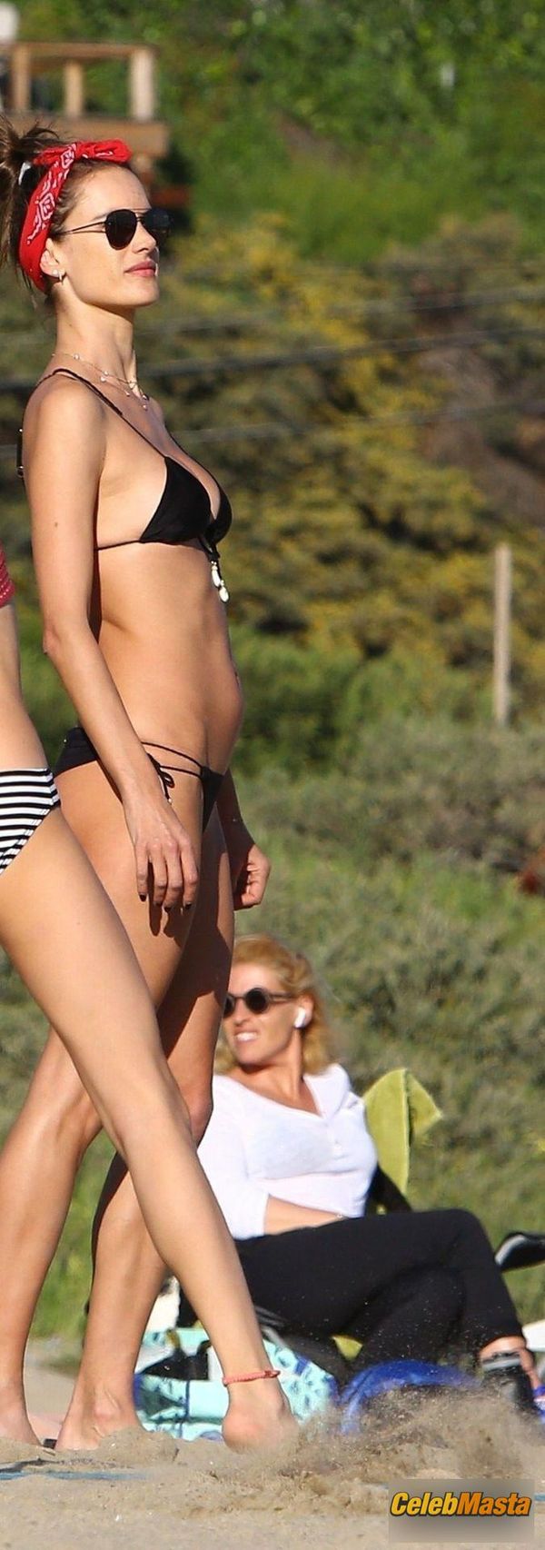 Alessandra Ambrosio putting her amazing curves on display in a cheeky black bikini during an afternoon spent on the beach playing volleyball in Los Angeles photo 16