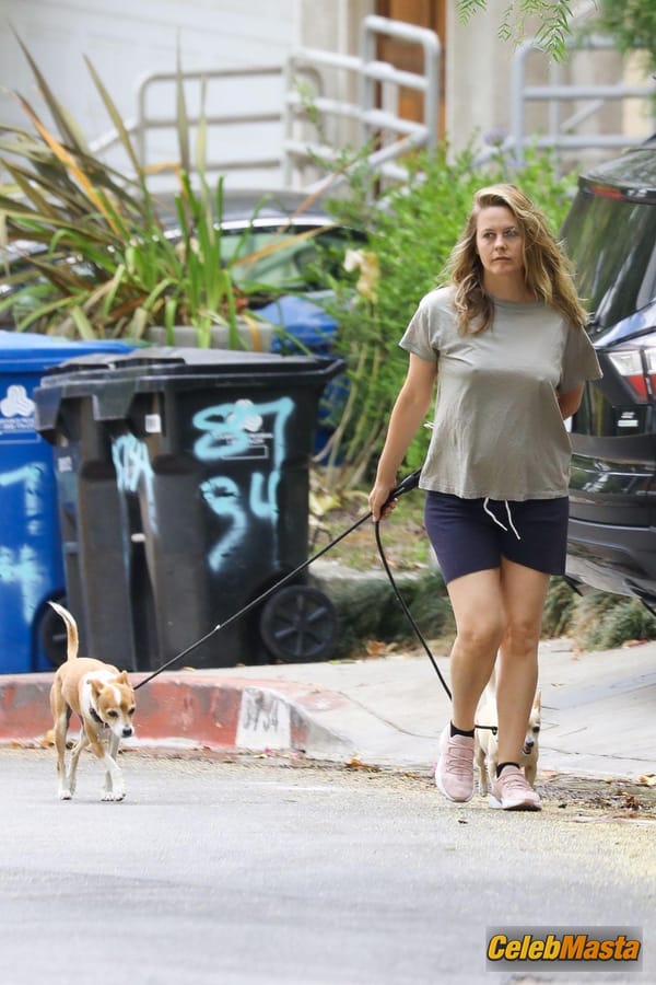 Alicia Silverstone taking a stroll near the $597K four-bedroom Hollywood Hills home she bought way back in 1996 photo 5