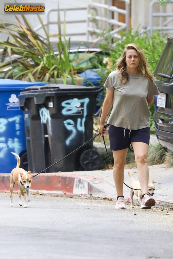 Alicia Silverstone taking a stroll near the $597K four-bedroom Hollywood Hills home she bought way back in 1996 photo 6