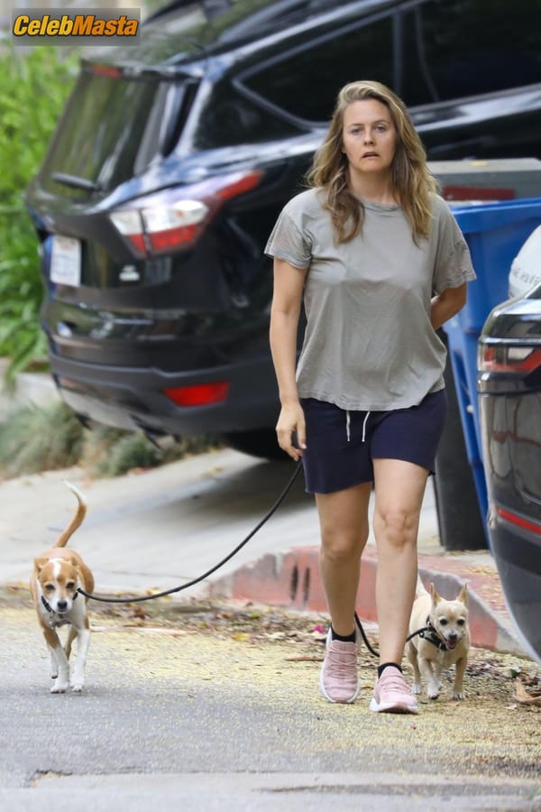 Alicia Silverstone taking a stroll near the $597K four-bedroom Hollywood Hills home she bought way back in 1996 photo 8