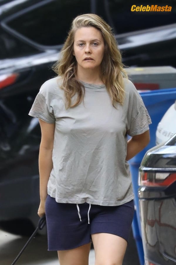 Alicia Silverstone taking a stroll near the $597K four-bedroom Hollywood Hills home she bought way back in 1996 photo 12